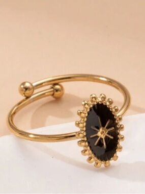 Gold Open Band Ring with Black Oval Star Accent